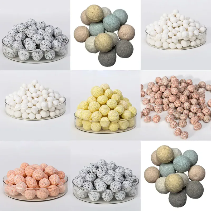 Round porous ceramic balls displayed in glass bowls